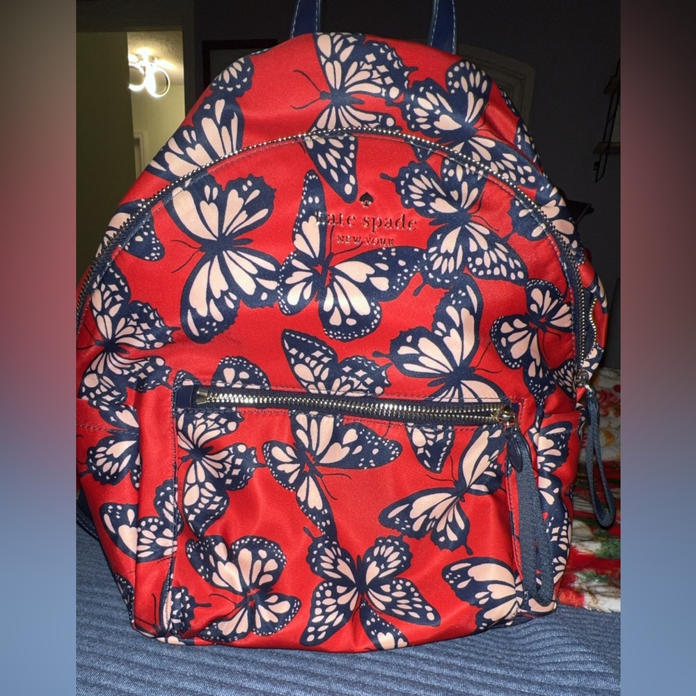 Kate Spade Red and Blue Backpack with Butterfly Design